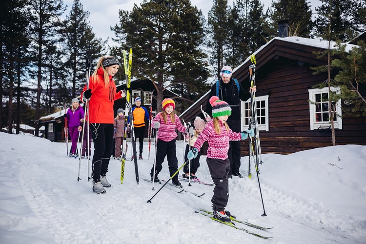 Cross country skiing amongst the cabins.